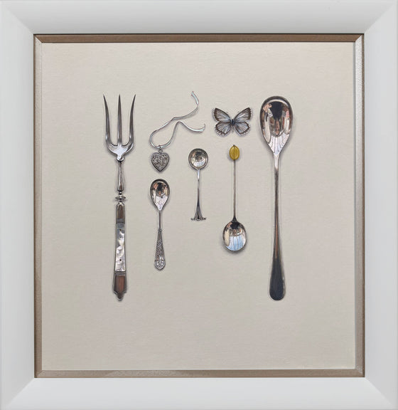 Silverware Arrangement with Locket and Blue Butterfly