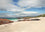 Billowing Clouds, Red Rocks and White Sands, Iona