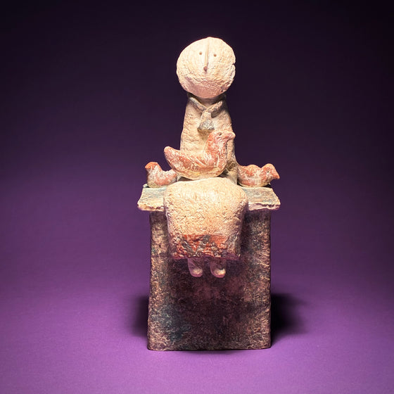 Seated Figure with Three Red Birds