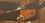 Fragmented Figure with Orange Form