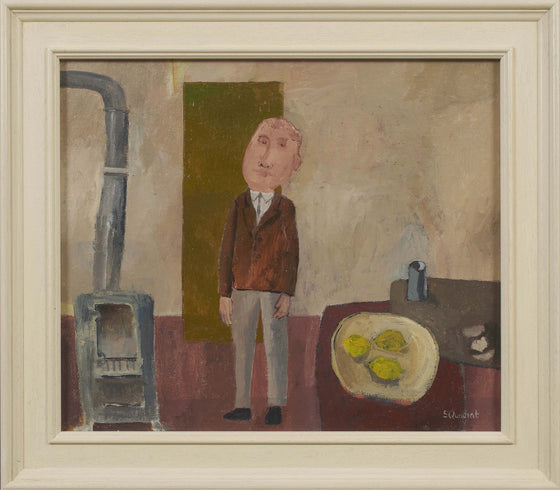 Man standing by a stove