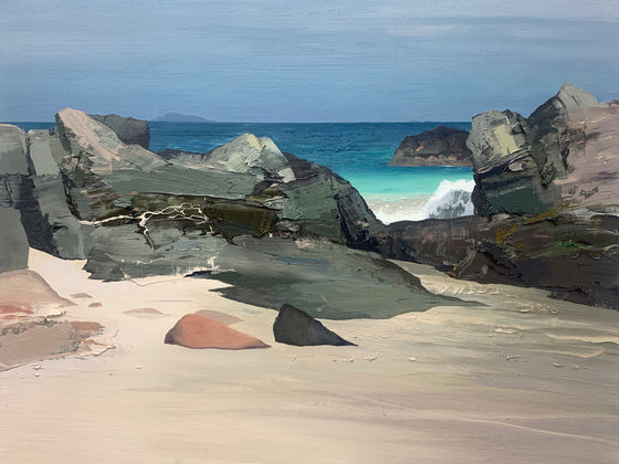A Glimpse of Turquoise Sea Through the Rocks